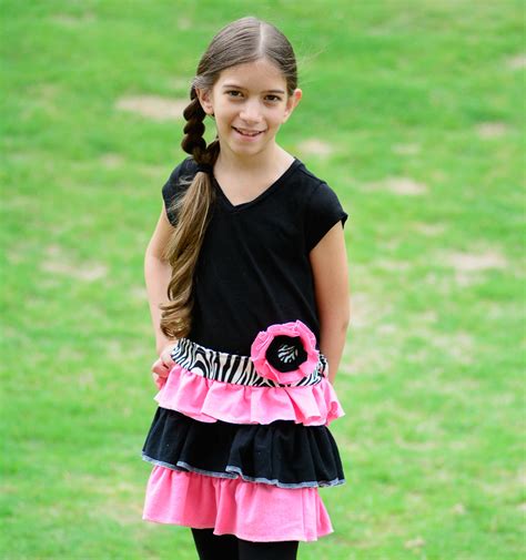 And, the good news is that you don't have to sew that well to make this! DIY Upcycled T-shirt Dress for Girls | AllFreeSewing.com