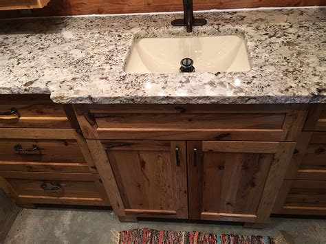 Alaskan White Granite With Chiseled Edge Burnished Bronze Faucet