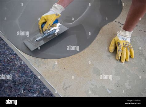 Spreading Concrete Filler Surface Stock Photo Alamy