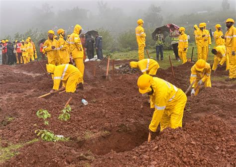 Death Toll Rises To 21 As Rescuers Find More Bodies In Landslide Hit