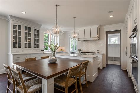 The hourglass legs give the illusion of more space and allow you to tuck the chairs in all the way. 4240 Sidell Trail, Edina, MN 55416 | Artisan Home Tour