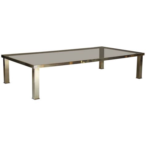 You can also use your coffee table as the focal point when entertaining by using it to serve drinks and snacks at arm's reach from the couch. Large Rectangular Brass and Glass Coffee Table, France ...