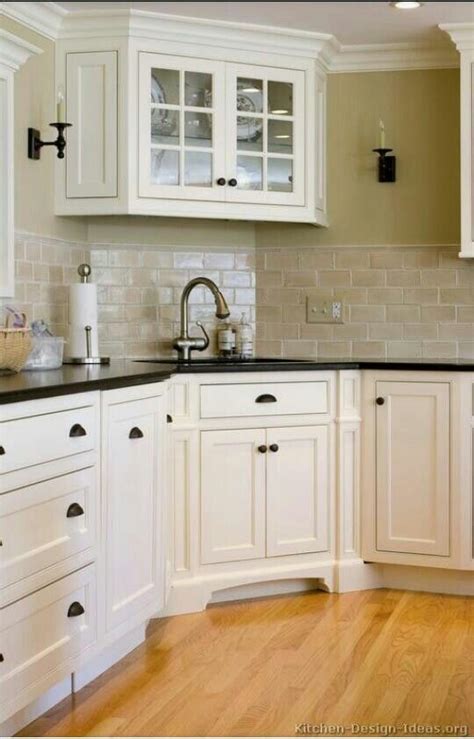 The cabinet height is 34 5 tall and it is 24 deep from the front face frame to the right or left corner of the cabinet. Cabinet over sink | Corner sink kitchen, Off white kitchen ...