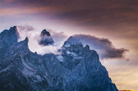 The clouds were incredible, and incredibly beautiful. Cloudy Mountain Peaks At Sunset Royalty Free Stock Photo ...