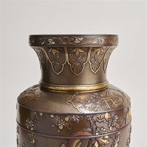 A Pair Of Japanese Multi Metal Bronze Vases By Kumagaya Bada