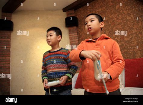 Two Boys Playing Games Stock Photo Alamy