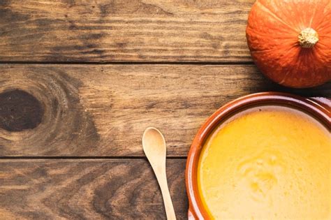 Spoon And Seeds Near Pumpkin Soup Photo Free Download