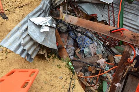 In Photos Rescuers Dig For Survivors In Naga Cebu Landslide