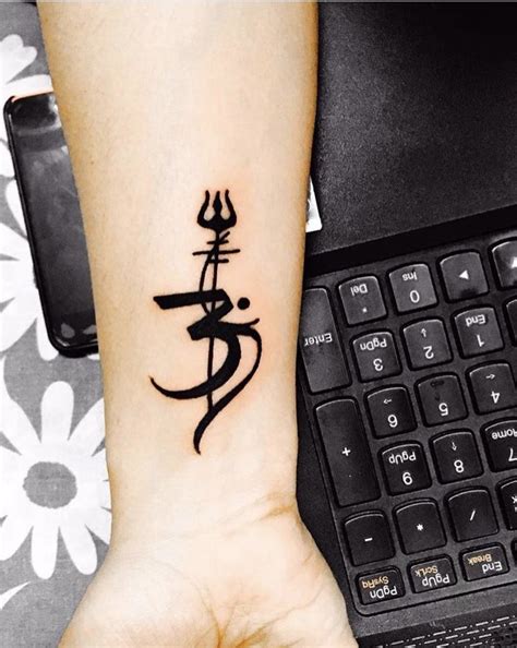 40+ wonderful trishul tattoo design and ideas. Aum with Trishul 🕉♐️ Tattoo #musictattoo | Trishul tattoo ...