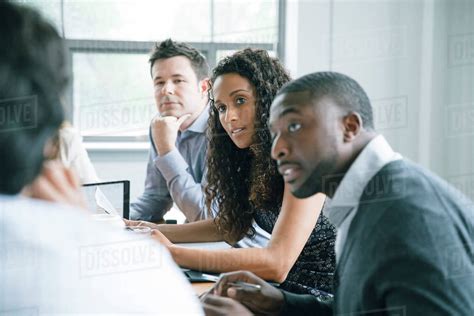 Business People Listening In Meeting Stock Photo Dissolve