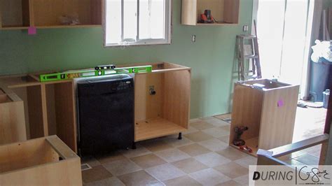 Shims are placed to ensure leveled surface and squared corners. Installing Ikea Base Cabinets | Madness & Method