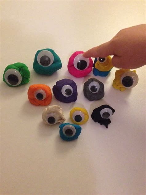Playdough Monsters Putting The Googly Eyes On Play Dough Monsters Was