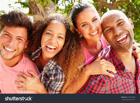 Group Of Friends Having Fun Outdoors Together Stock Photo 238707088