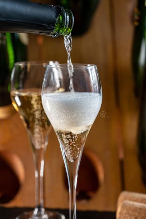 Glasses Of Sparkling White Wine Champagne Or Cava With Bubbles And