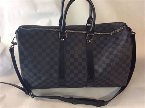 See full list on blog.pawnhero.ph Authentic Louis Vuitton Graphite Keepall 45 Duffel Bag No ...