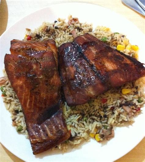 This healthy baked salmon is the best way to feed a crowd. Baked Salmon and Fried Rice Recipe - RecipeYum