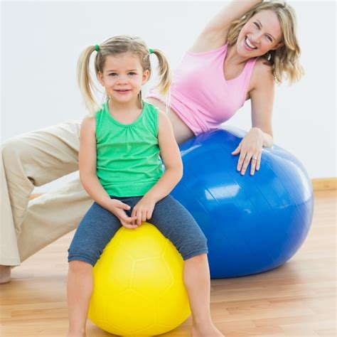 Premium Photo Smiling Pregnant Woman Exercising On Exercise Ball With