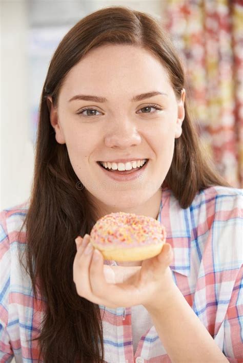 portrait of smiling teenage girl on eating donut stock image image of disorder dieting 56225745