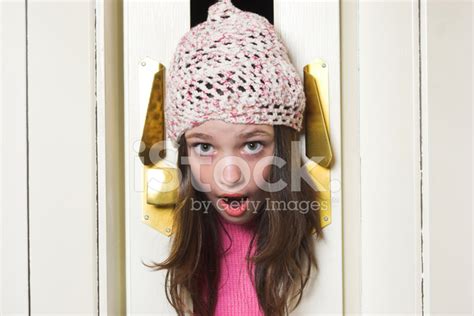 Girl Head Stuck In Accordion Door Stock Photos
