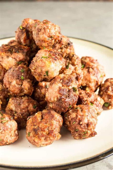 In a large bowl, combine the ground beef, ground pork, reserved onion and garlic mixture, bread crumbs, ricotta, parsley, eggs, parmesan, milk, salt, and pepper. Easy Homemade Spaghetti and Meatballs » The Thirsty Feast