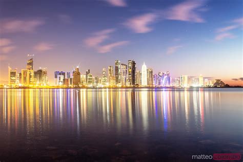 Doha Skyline And Harbor At Dusk Qatar Middle East Royalty Free Image