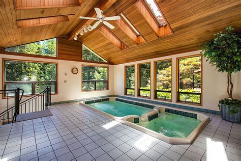 Maybe you would like to learn more about one of these? Rustic Hot Tub with exterior stone floors & Skylight in ...