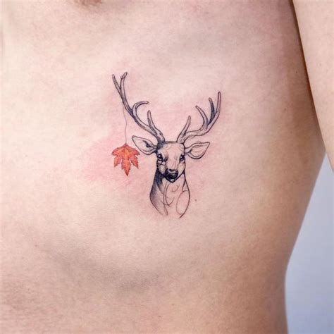 Small Deer With Maple Tattoo On The Side Girly Tattoos Wrist Tattoos