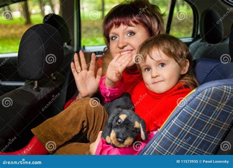 Woman And Girl Greeting To Wave Hands In Car Stock Image Image Of