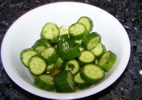 Slice cucumber into bite size strips. 1 large cucumber, or 3 miniature cucumbers 1 tablespoon ...