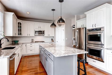 Studio strongwater is a design and consulting firm that creates functional, beautiful, custom kitchens as unique as the people who live and work within them. Erie Builder Grade Kitchen Upgrade - Traditional - Kitchen ...