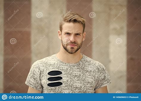 Man With Bristle On Strict Concentrated Face Pink Background