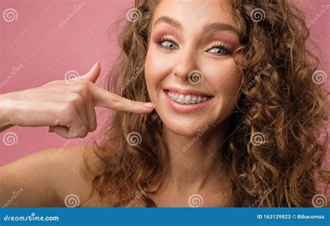 Happy Girl With Curly Hair And Dental Braces Stock Image Image Of