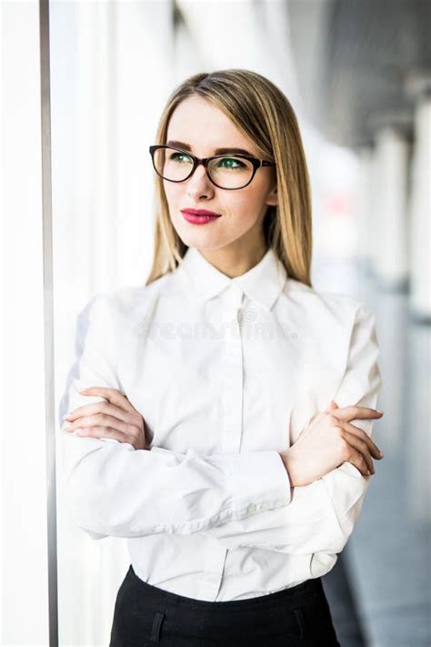Beautiful Business Woman In Formal Wear And Eyeglasses In Modern Office