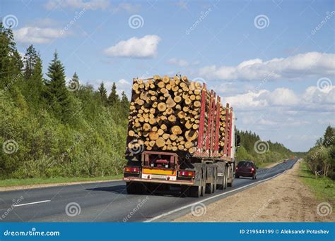Loaded Timber Truck Rides On The Highway Road Transport Stock Image