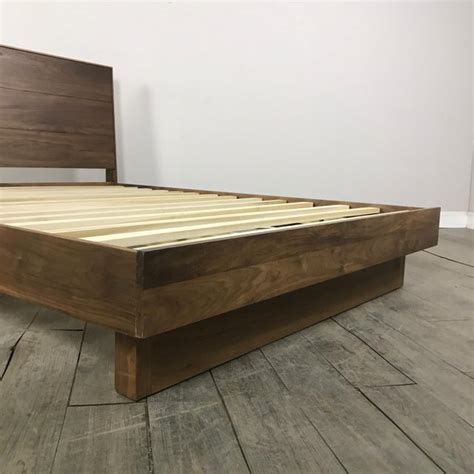 Jul 14, 2021 · walken hydraulic bed (queen size, walnut finish) add to cart. Room & Board Walnut Queen Bed Frame | Chairish