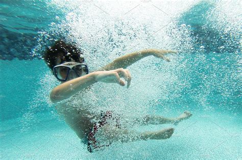 Boy Swimming Underwater High Quality Sports Stock Photos Creative