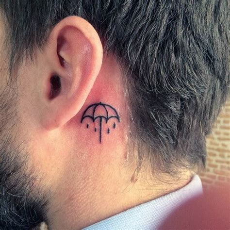 Volumetric smoky feather tattoo for men behind the ear. 100 Ear Tattoos For Men - Inner And Outer Design Ideas