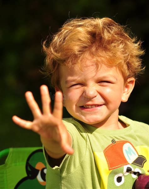 Little Boy Waving Into The Sun Stock Photo Image Of Waves Golden