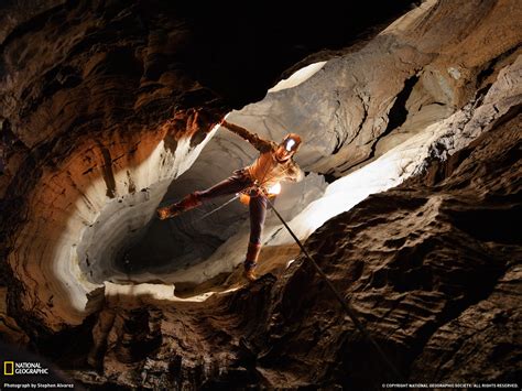 Man Descends Into The Cave Wallpapers And Images Wallpapers Pictures