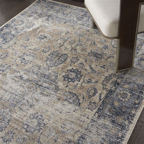 This area rug conveys a sense of movement and energy that verges on divine. Nourison Malta MAI13 Blue Ivory Rug