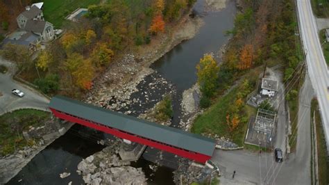 6k Stock Footage Aerial Video Flying By Small Covered Bridge
