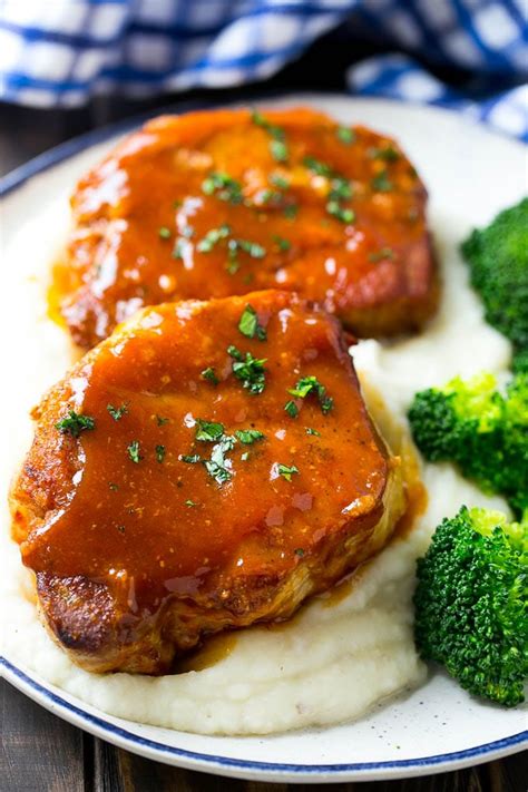 These easy honey garlic pork chops are coated in a sweet and savory sauce, then cooked in the slow cooker until tender and succulent. Honey Garlic Pork Chops (Slow Cooker) - Dinner at the Zoo
