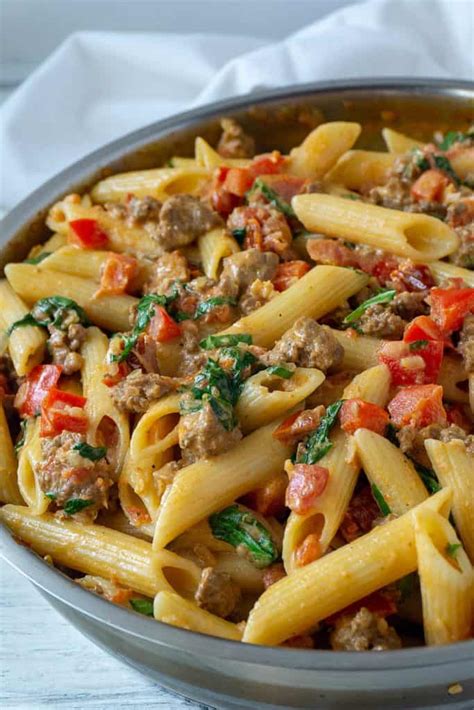 creamy italian sausage and tomato pasta foodtasia