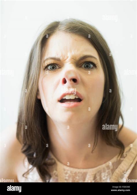 Woman Making Funny Face On Glass Stock Photo Alamy