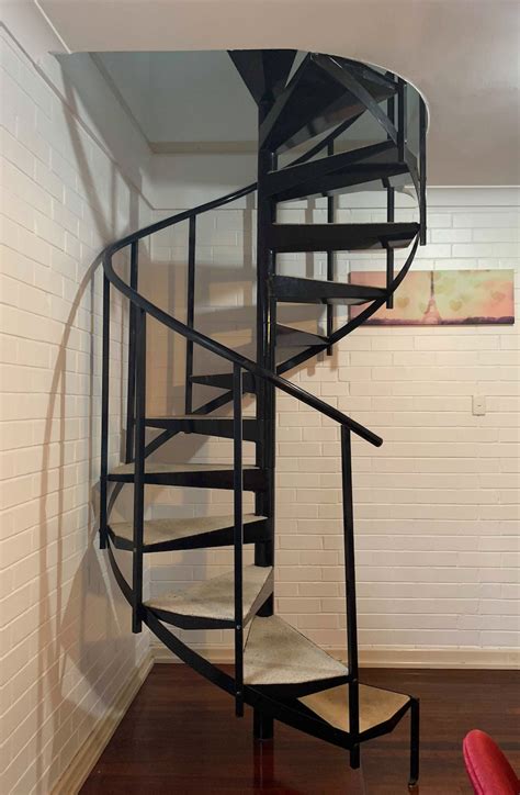 Spiral staircase may refer to: File:Industrial spiral staircase.png - Wikipedia