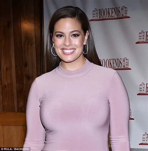 ashley graham shows off sexy curves in figure hugging dress