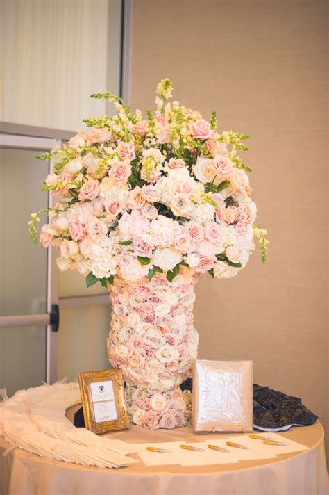 You can even have a different arrangement for every number to make each table unique, or match the flowers to your bouquets. Ceremony Décor Photos - Pastel Floral Arrangement in Fresh ...