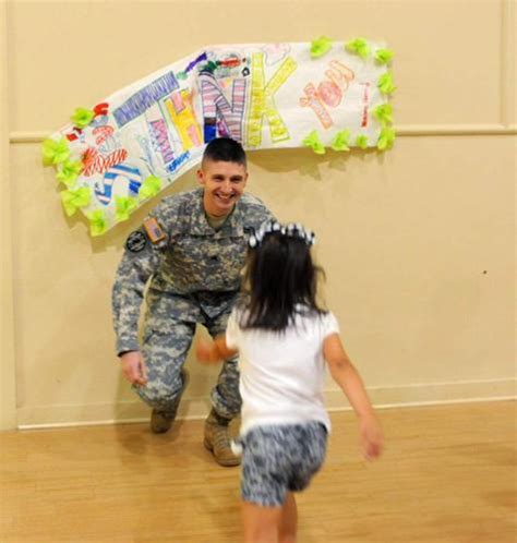Returning Soldier Surprises Daughters At Preschool Zachary