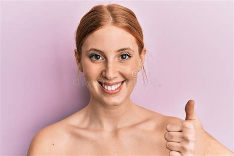 Young Irish Woman Standing Topless Showing Skin Smiling Happy And