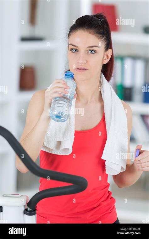 Fit Young Woman Drinking Water After Step Exercise Stock Photo Alamy